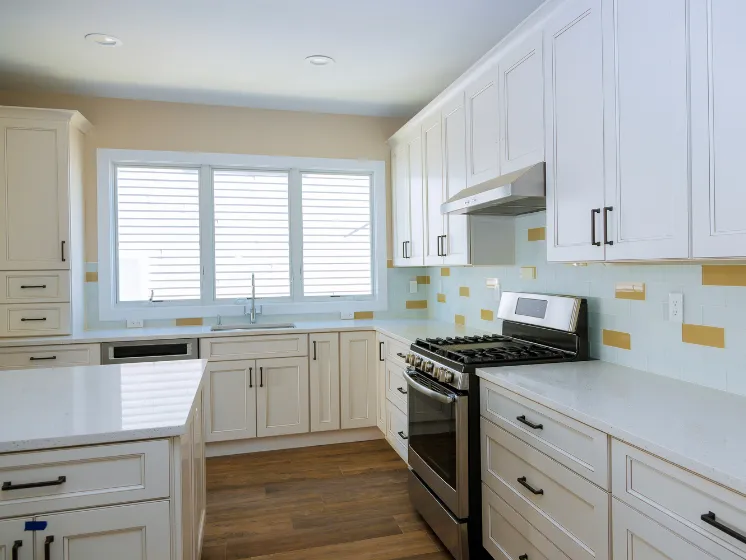 Custom kitchen cabinets installation by Kitchen Pro Dallas, featuring professionally installed white cabinetry, modern hardware, and seamless design