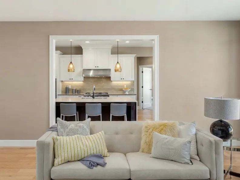 Open concept kitchen and living room reconfiguration with framed wall opening in Dallas TX home renovation